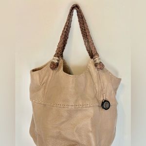 The Sak bag in brown. Great condition.